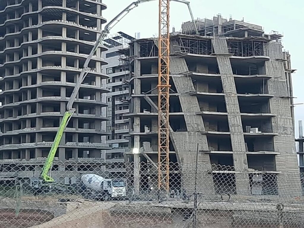 Towers under construction in the Marota City regulated zone in Damascus — the project at the forefront of the test for the new height and visual-protection rules